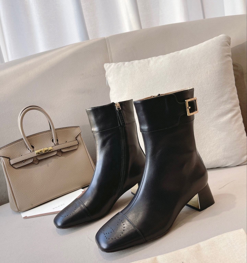 G*u*i boots